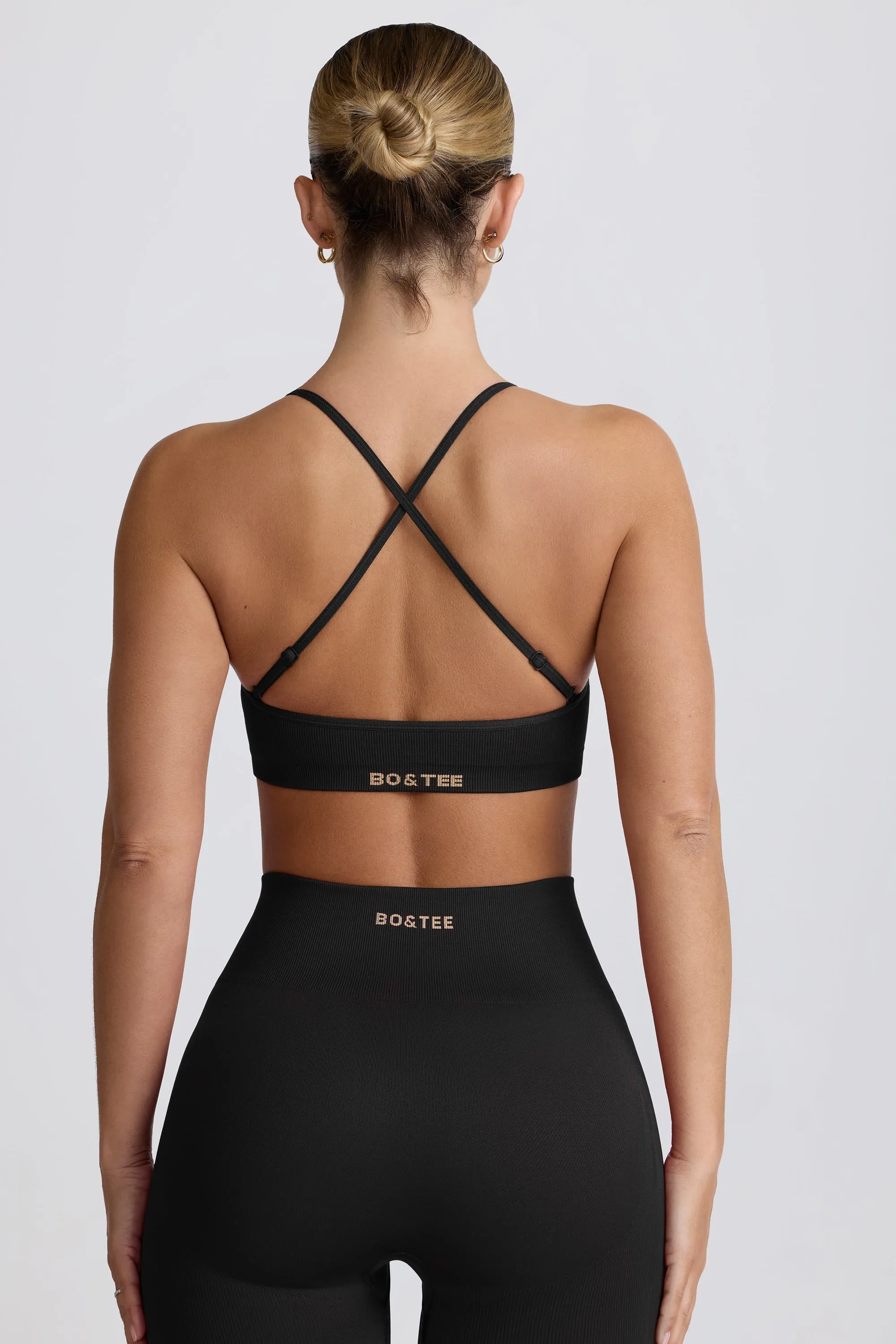 Super Sculpt Seamless Cross-Back Sports Bra in Black sold by Bo + Tee product image thumbnail 3