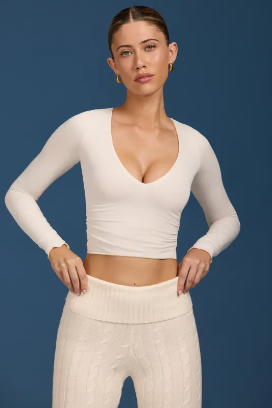 Ruched Long-Sleeve Crop Top in Cream sold by Bo + Tee