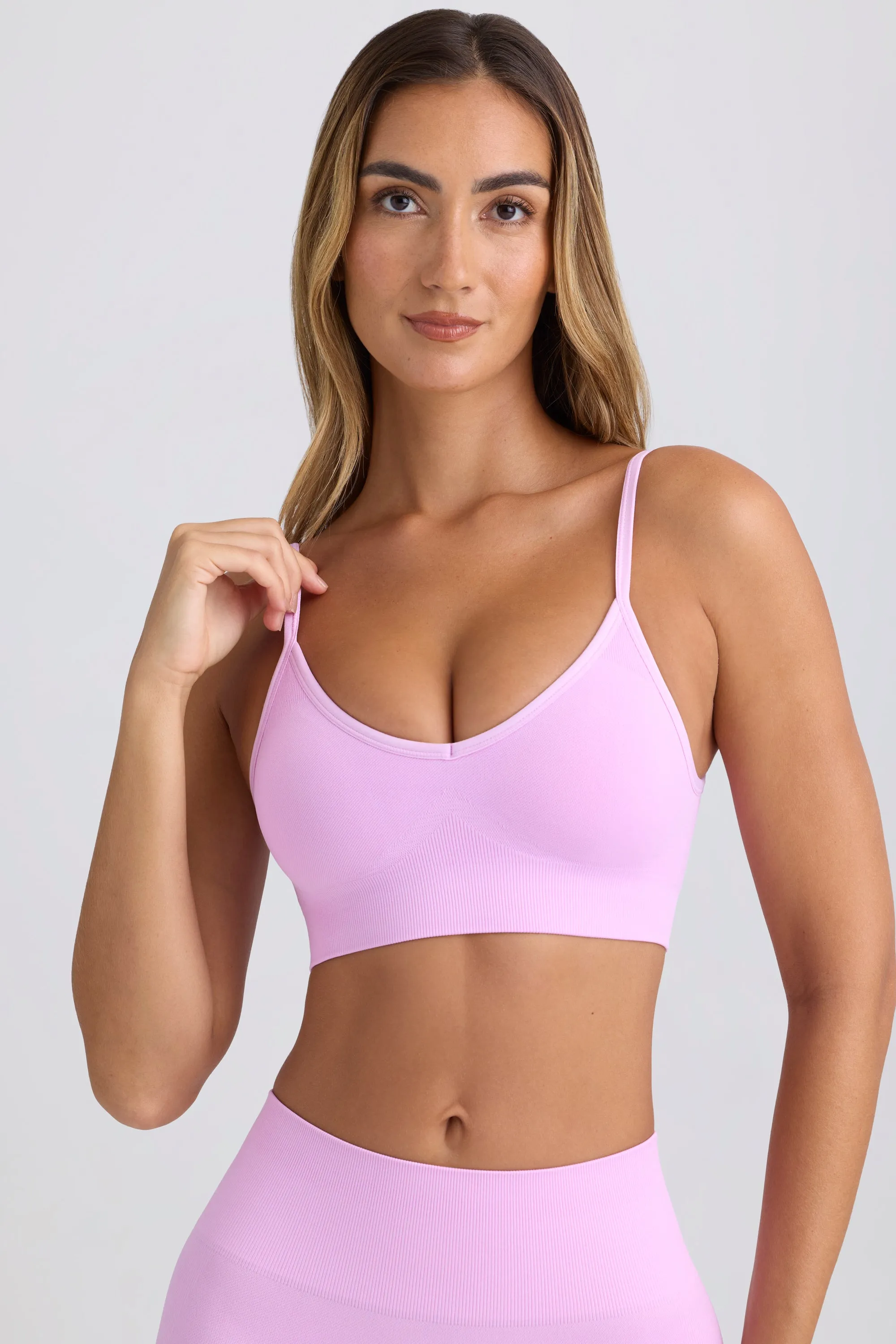 Super Sculpt Seamless Scoop-Back Sports Bra in Violet Pink sold by Bo + Tee product image thumbnail 4