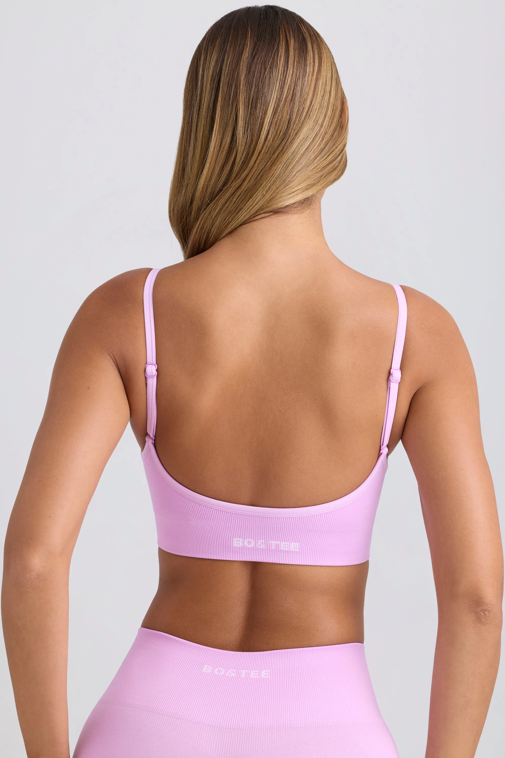 Super Sculpt Seamless Scoop-Back Sports Bra in Violet Pink sold by Bo + Tee product image thumbnail 3