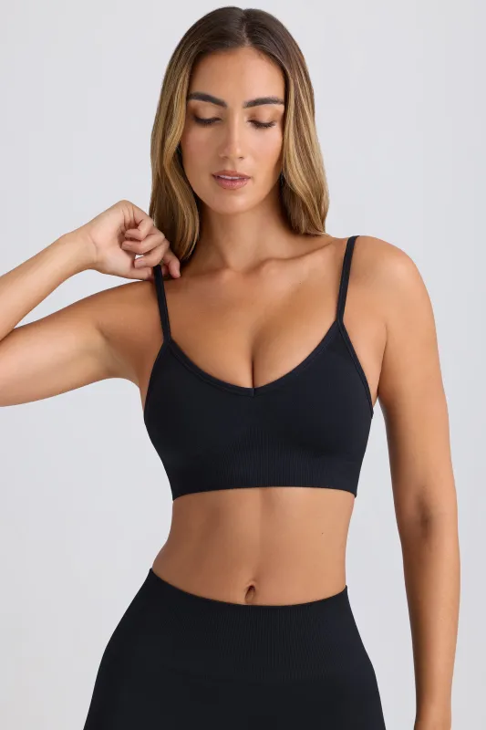 Super Sculpt Seamless Scoop-Back Sports Bra in Black sold by Bo + Tee