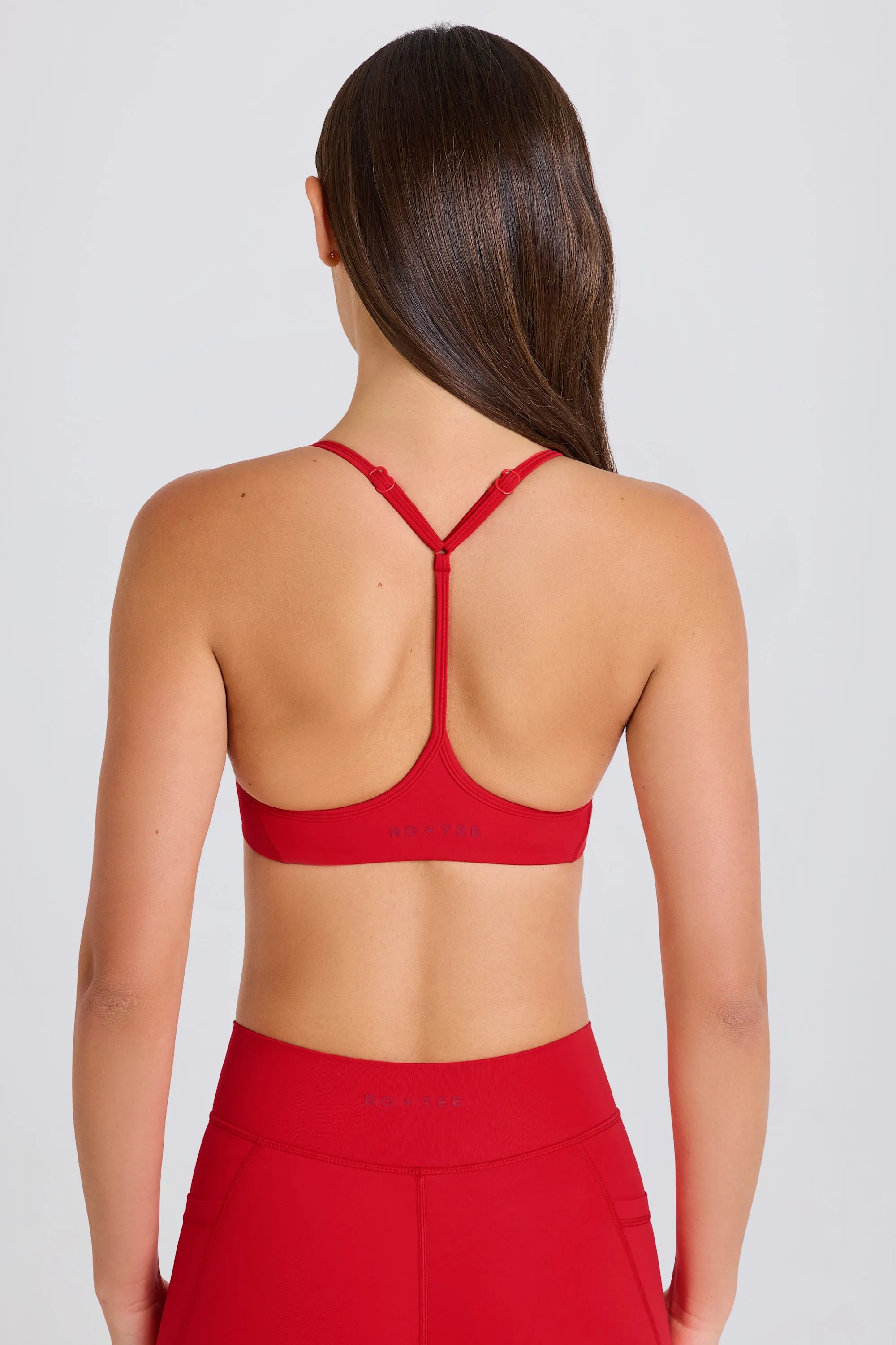Soft Active Racerback Sports Bra in Strawberry Red sold by Bo + Tee product image thumbnail 2