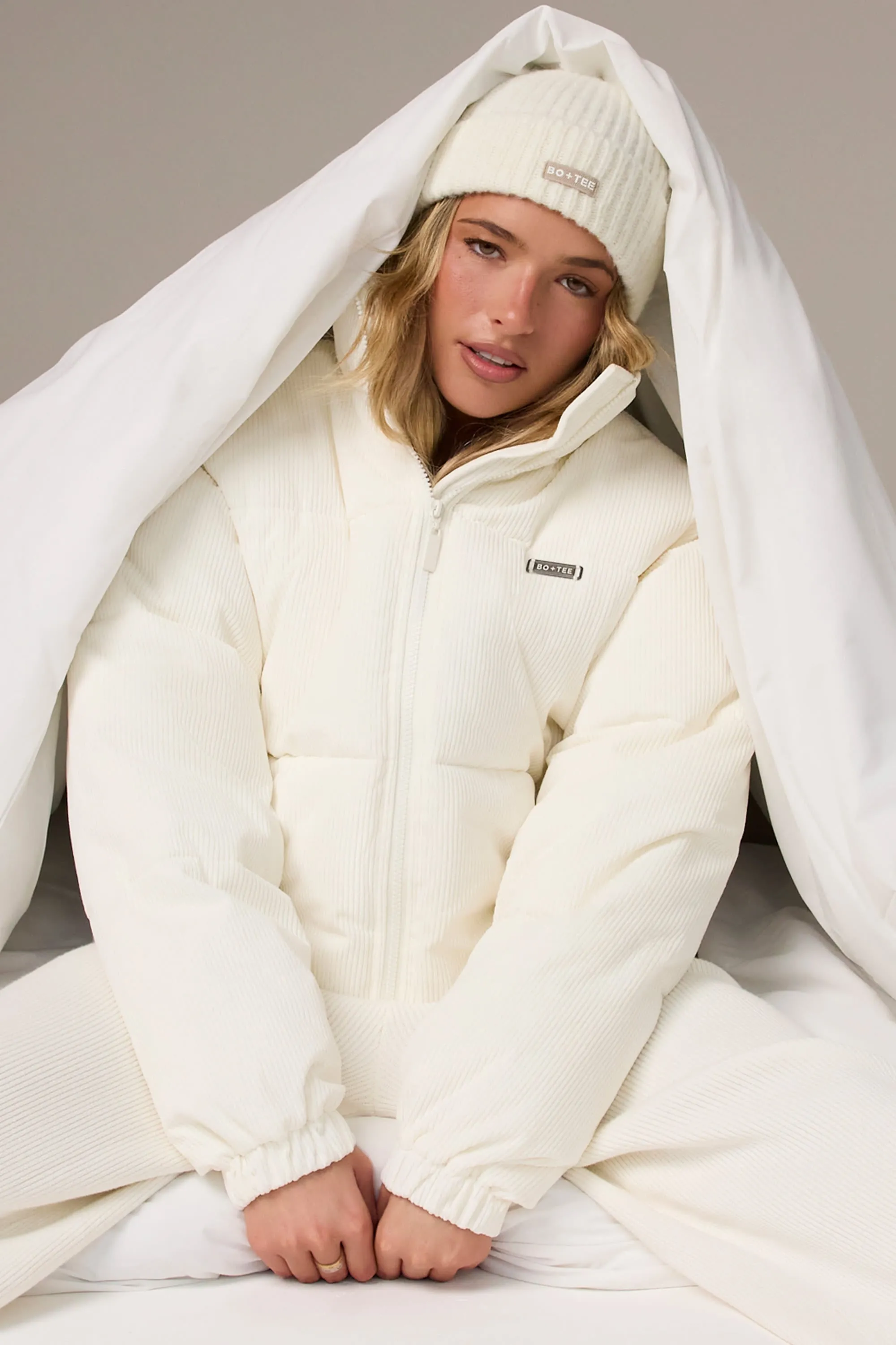 Corduroy Quilted Puffer Jacket in Ivory sold by Bo + Tee