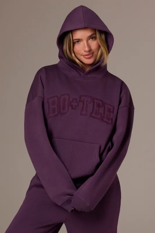 Embroidered Oversized Hoodie in Plum sold by Bo + Tee