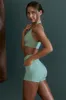 Courage - Plunge Neck Wrap Over Sports Bra in Sage sold by Bo + Tee