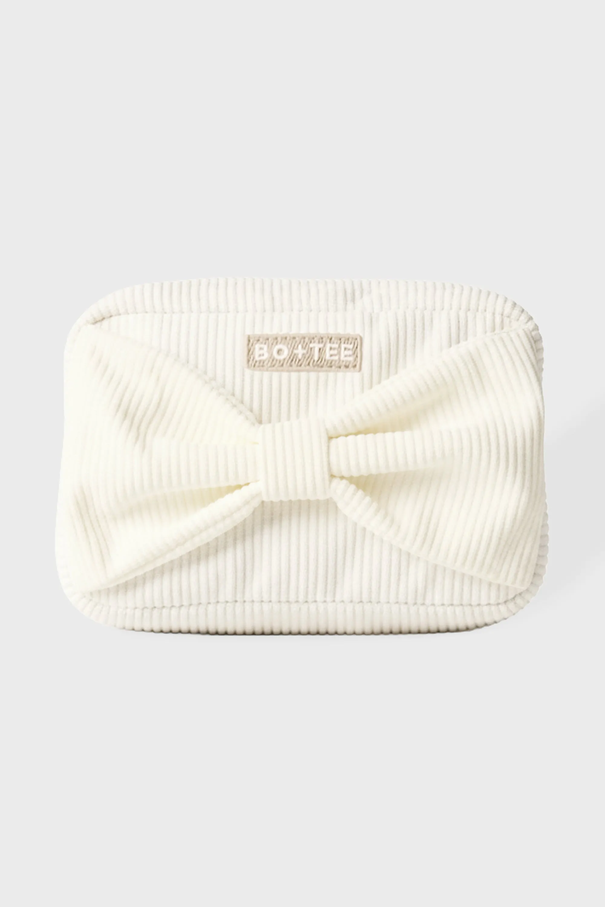 Corduroy Bow Makeup Bag in Milk sold by Bo + Tee