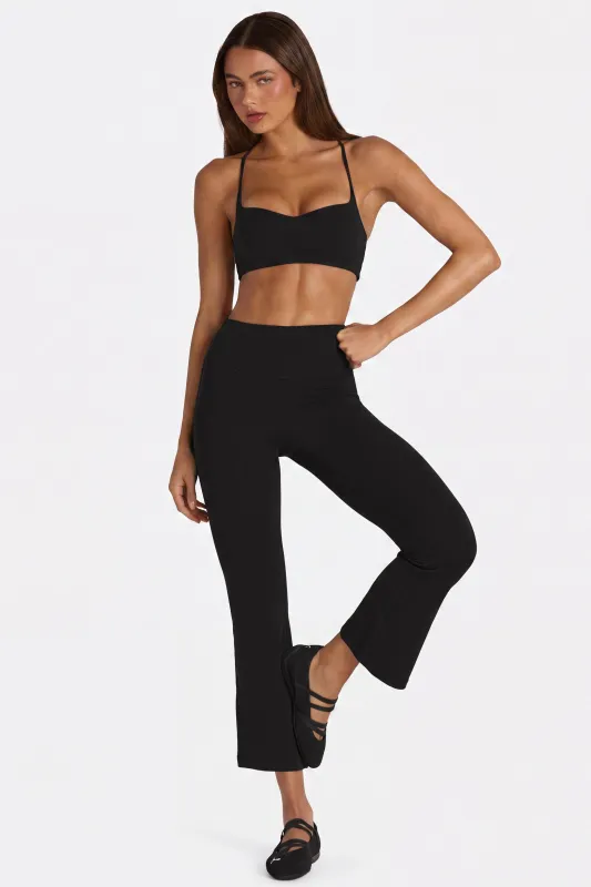 Soft Active Flared Capri Leggings in Black made by Bo + Tee