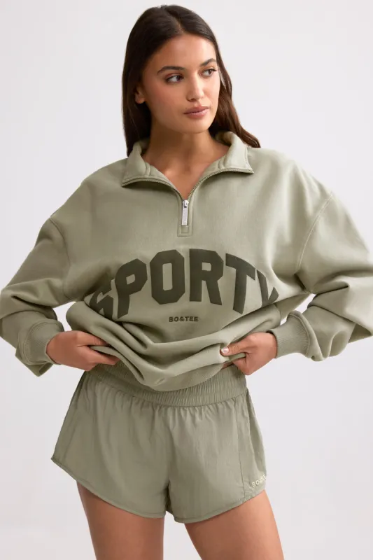 Quarter-Zip Sweatshirt in Mineral made by Bo + Tee
