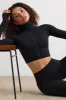 Soft Active Turtleneck Crop Top in Black sold by Bo + Tee