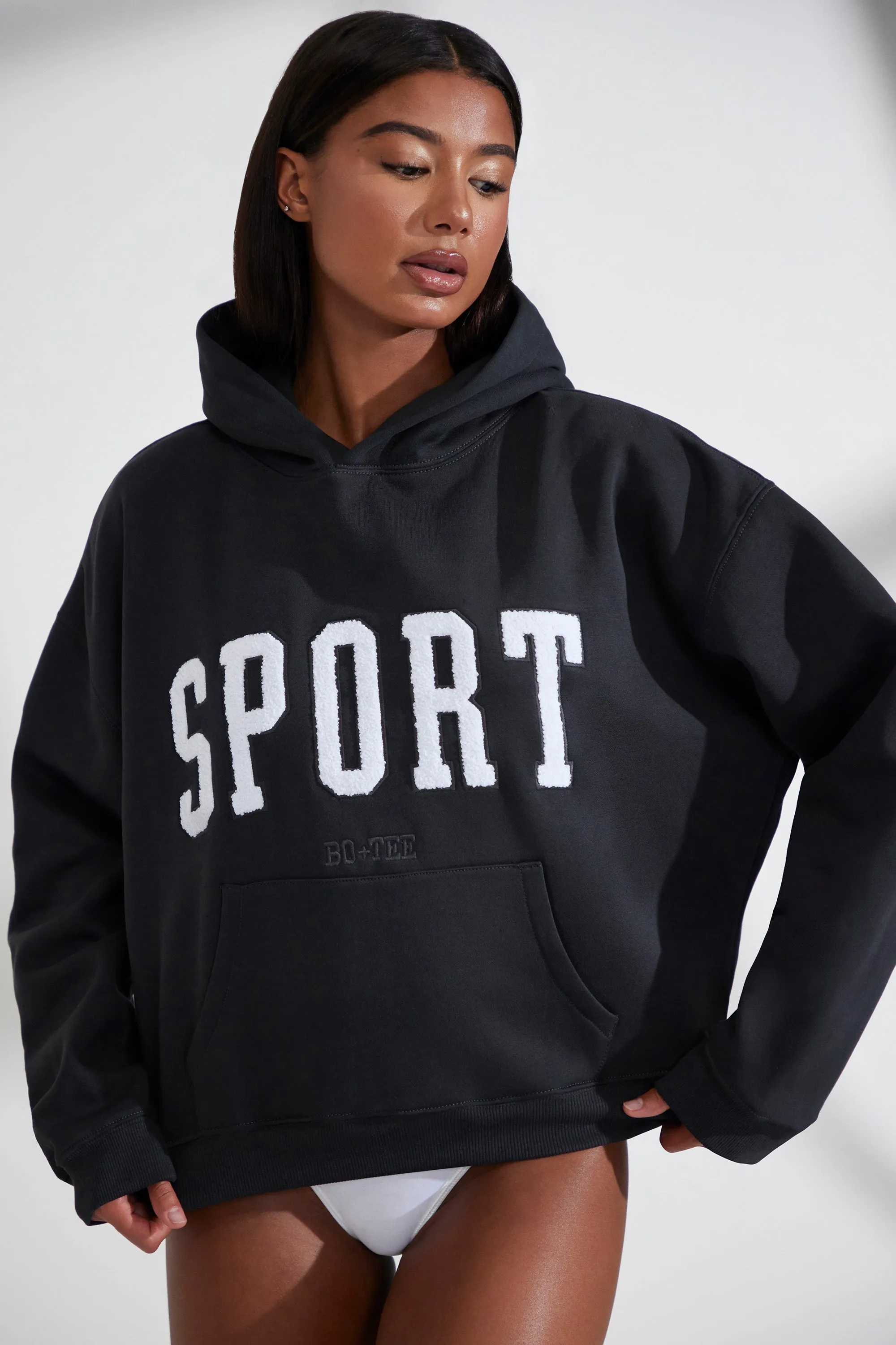 Oversized Hooded Sweatshirt in Black sold by Bo + Tee
