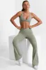 Match - Cross Waistband Flare Pocket Leggings in Bamboo Green sold by Bo + Tee