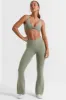 Match - Cross Waistband Flare Pocket Leggings in Bamboo Green sold by Bo + Tee