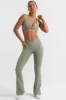 Match - Cross Waistband Flare Pocket Leggings in Bamboo Green sold by Bo + Tee
