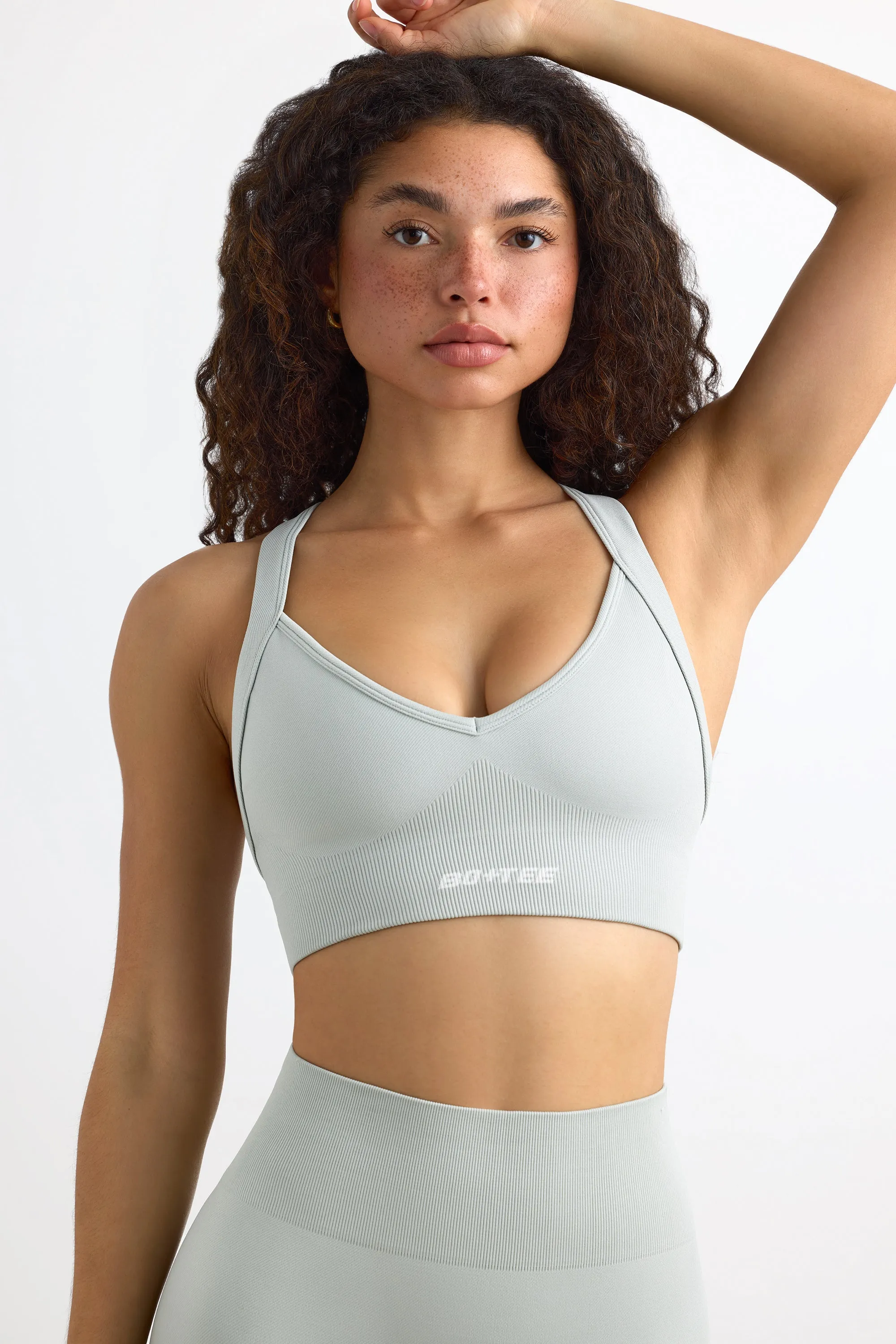 Super Sculpt Seamless Cross-Back Sports Bra in Fog sold by Bo + Tee product image thumbnail 5