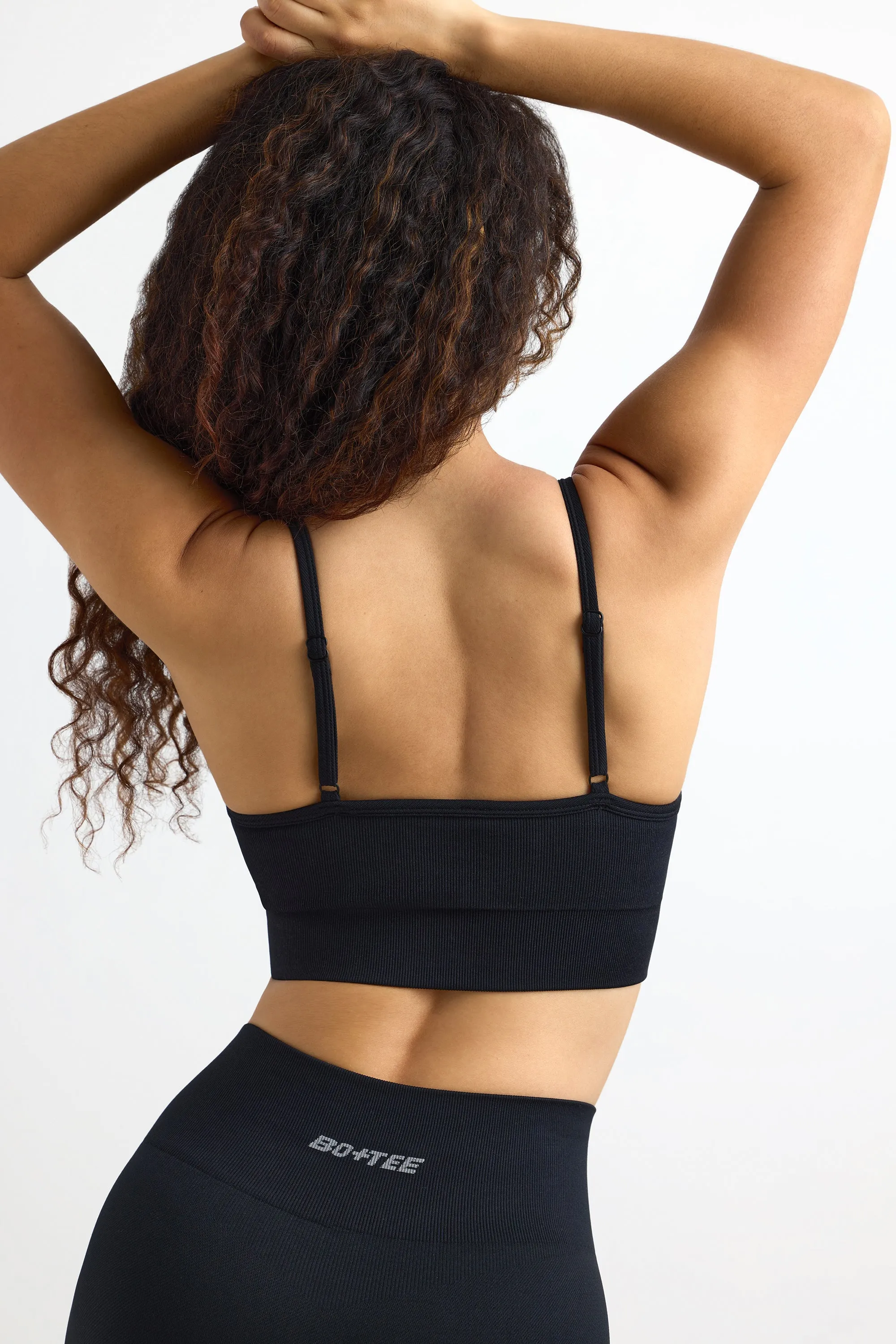Super Sculpt Seamless Scoop-Neck Sports Bra in Black sold by Bo + Tee product image thumbnail 3