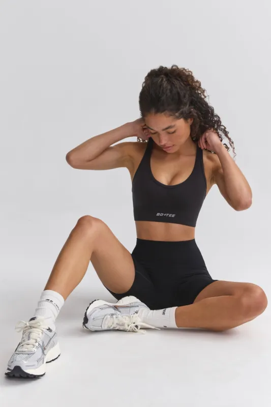 Define Luxe Halterneck Sports Bra in Jet Black sold by Bo + Tee