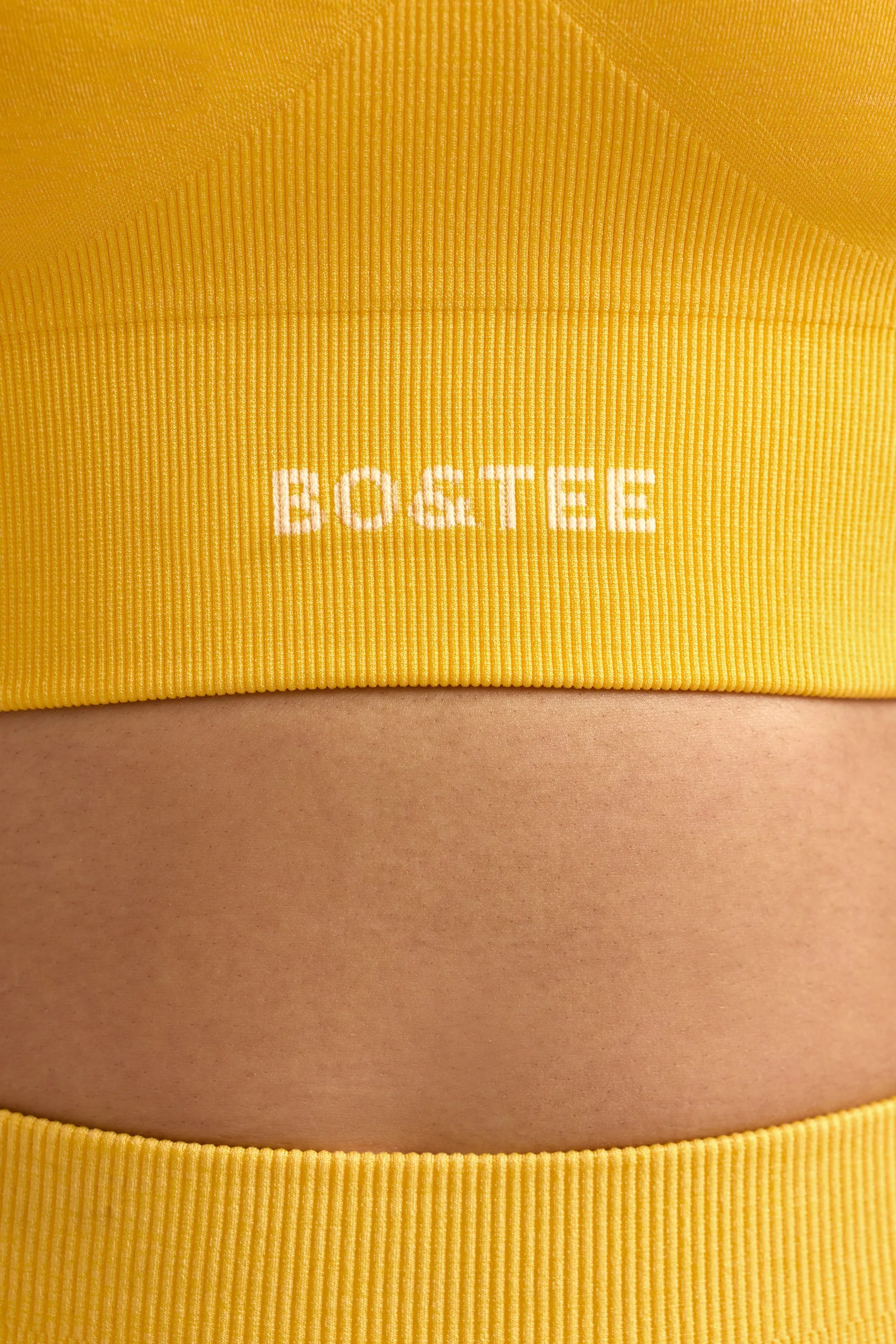 Define Luxe Halterneck Sports Bra in Golden Yellow sold by Bo + Tee product image thumbnail 4