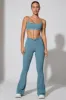 Realign - Petite Twist Waist Flare Leggings in Slate Blue sold by Bo + Tee