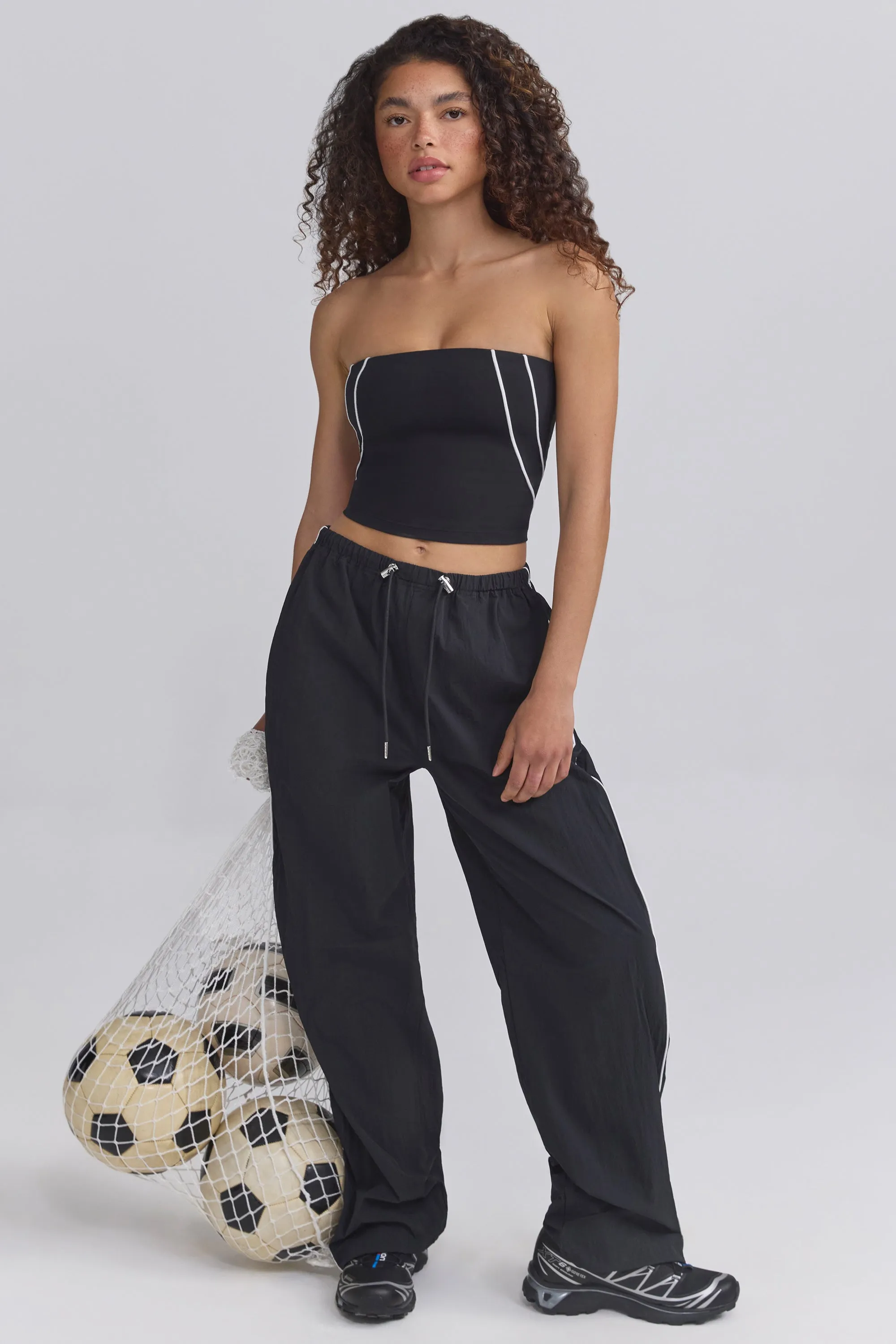 Water-Repellent Crinkled Wide-Leg Trousers in Black sold by Bo + Tee