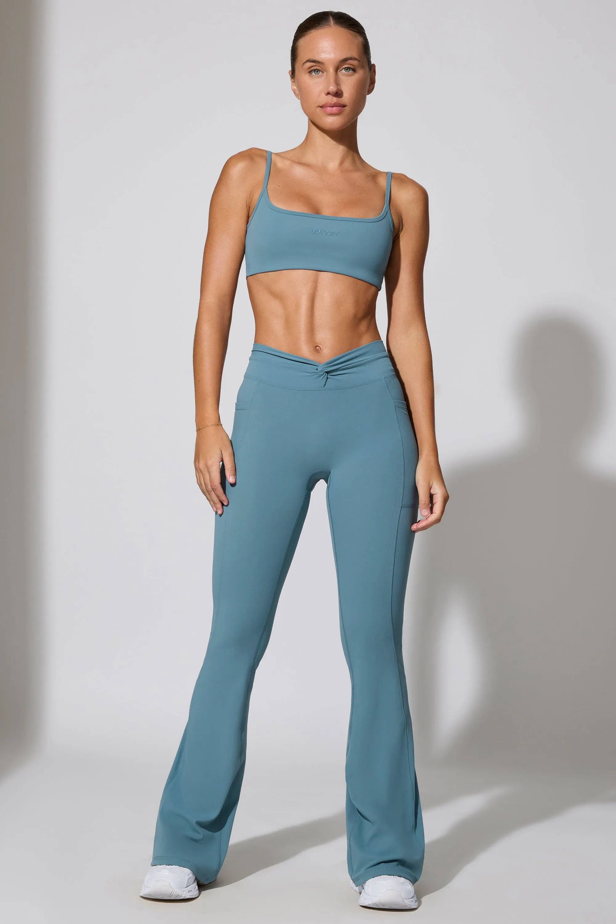 Realign - Twist Waist Flare Leggings in Slate Blue sold by Bo + Tee product image thumbnail 5