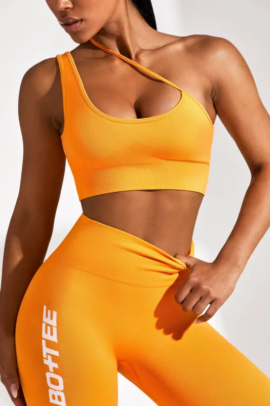 Evolve - Asymmetric Seamless Crop Top in Orange sold by Bo + Tee