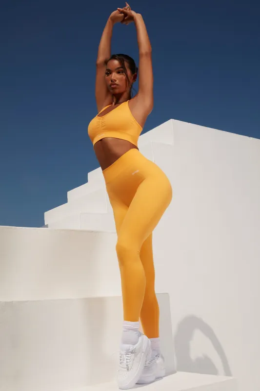 Surge Petite - Leggings in Light Orange sold by Bo + Tee