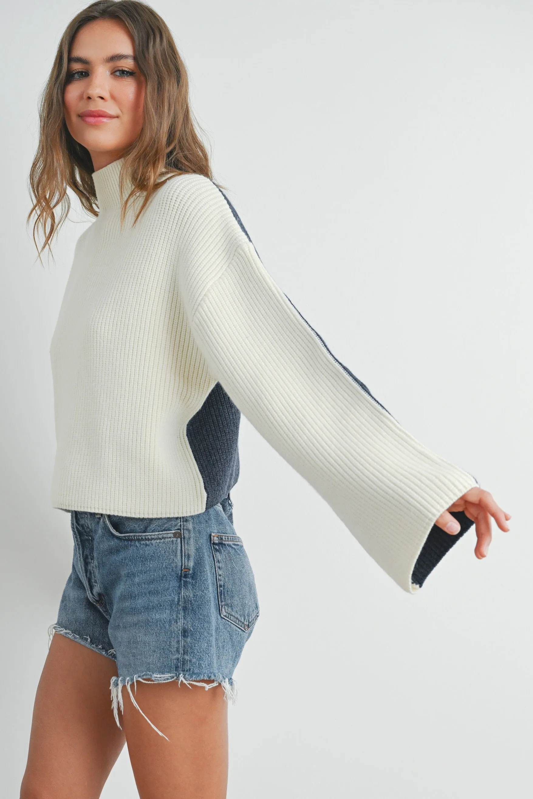 Two Tone Mock Neck Sweater sold by Evercado