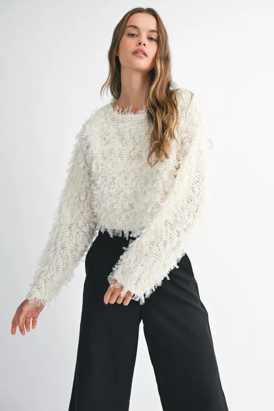 Textured Fringe Long Sleeve Cropped Top sold by Evercado