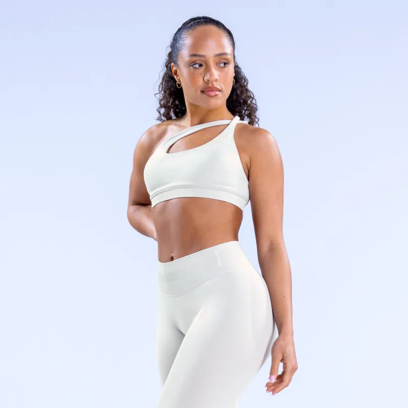 Impact Asymmetric Sports Bra sold by Dfyne