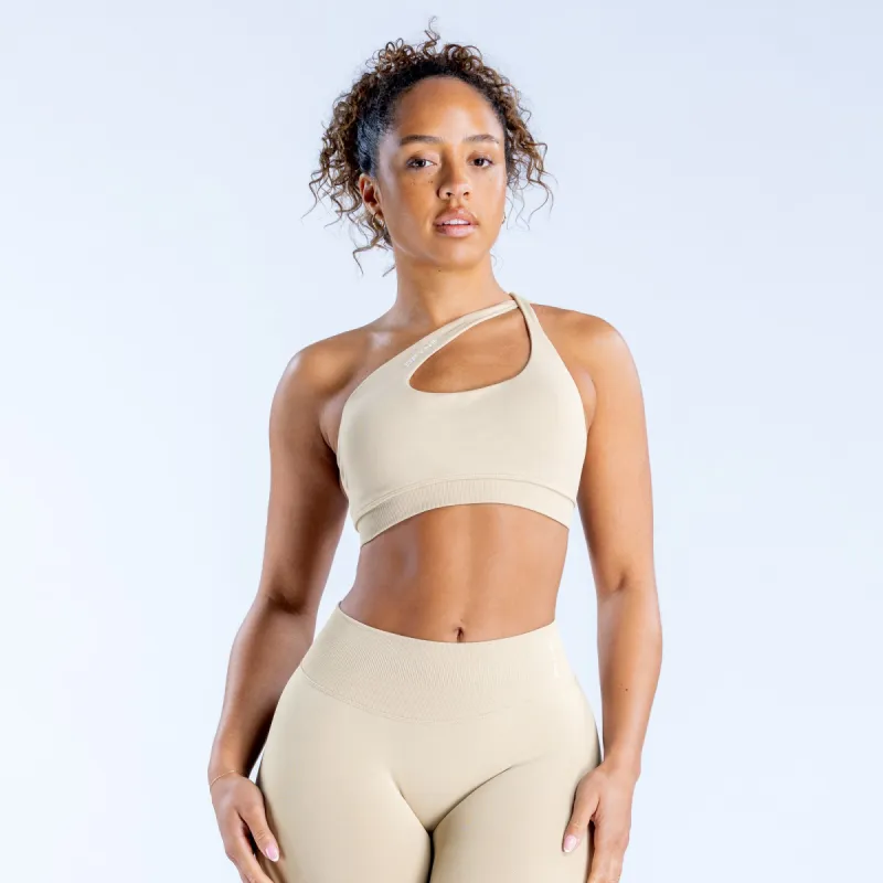 Impact Asymmetric Sports Bra sold by Dfyne
