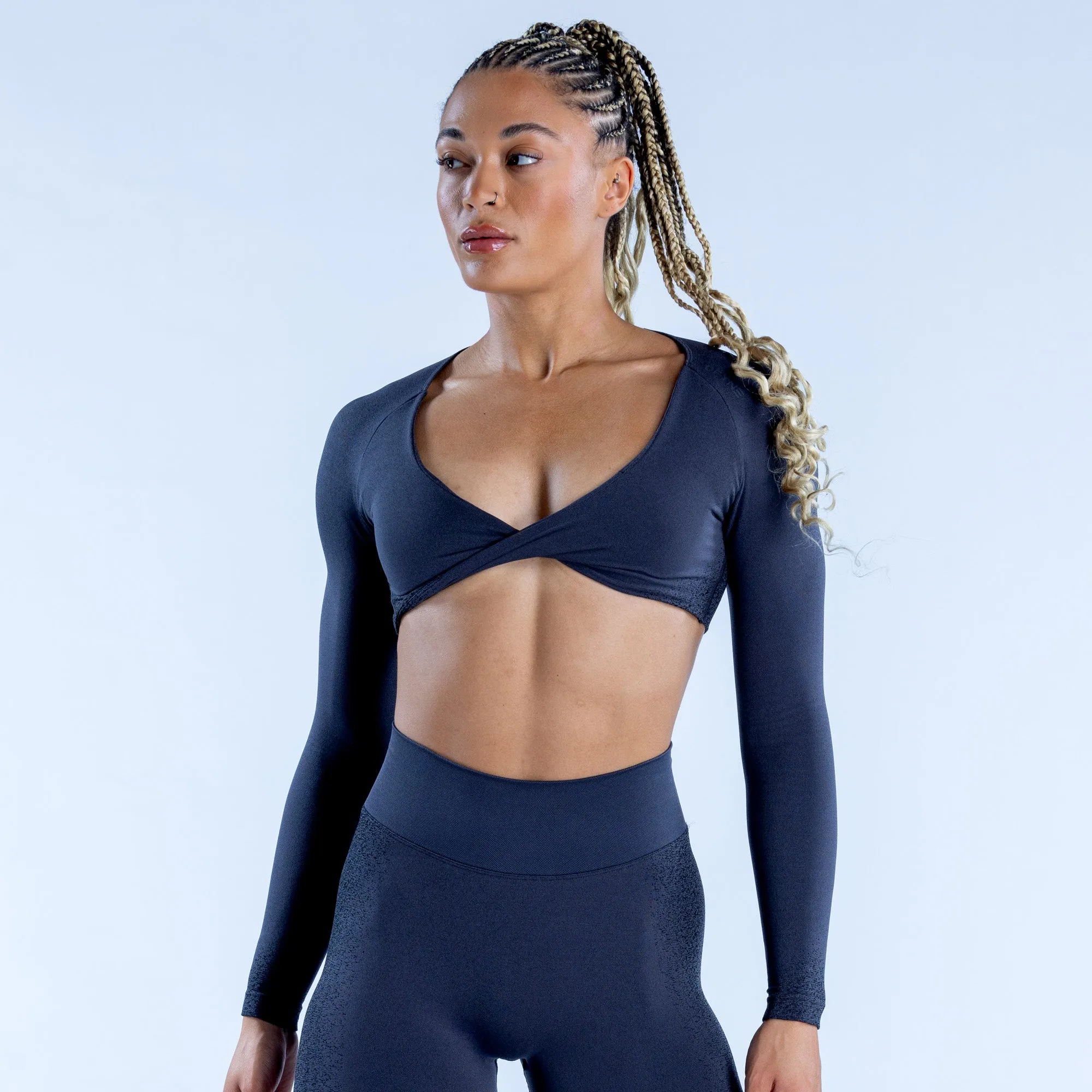 Ignite Twist Front Crop Top sold by Dfyne