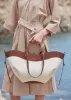 Cyme - Cognac Canvas sold by Polene