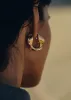 Éole Wavy Hoop Earrings - 24 carat gold-gilded edition sold by Polene