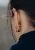 Éole Curled Earrings - 24 carat gold-gilded edition sold by Polene
