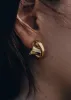 Éole Curled Earrings - 24 carat gold-gilded edition sold by Polene