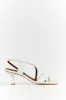 ALOHAS ASYMMETREIC WHITE HEEL sold by Dissh
