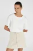 DION NATURAL BOUCLE MINI SKIRT sold by Dissh