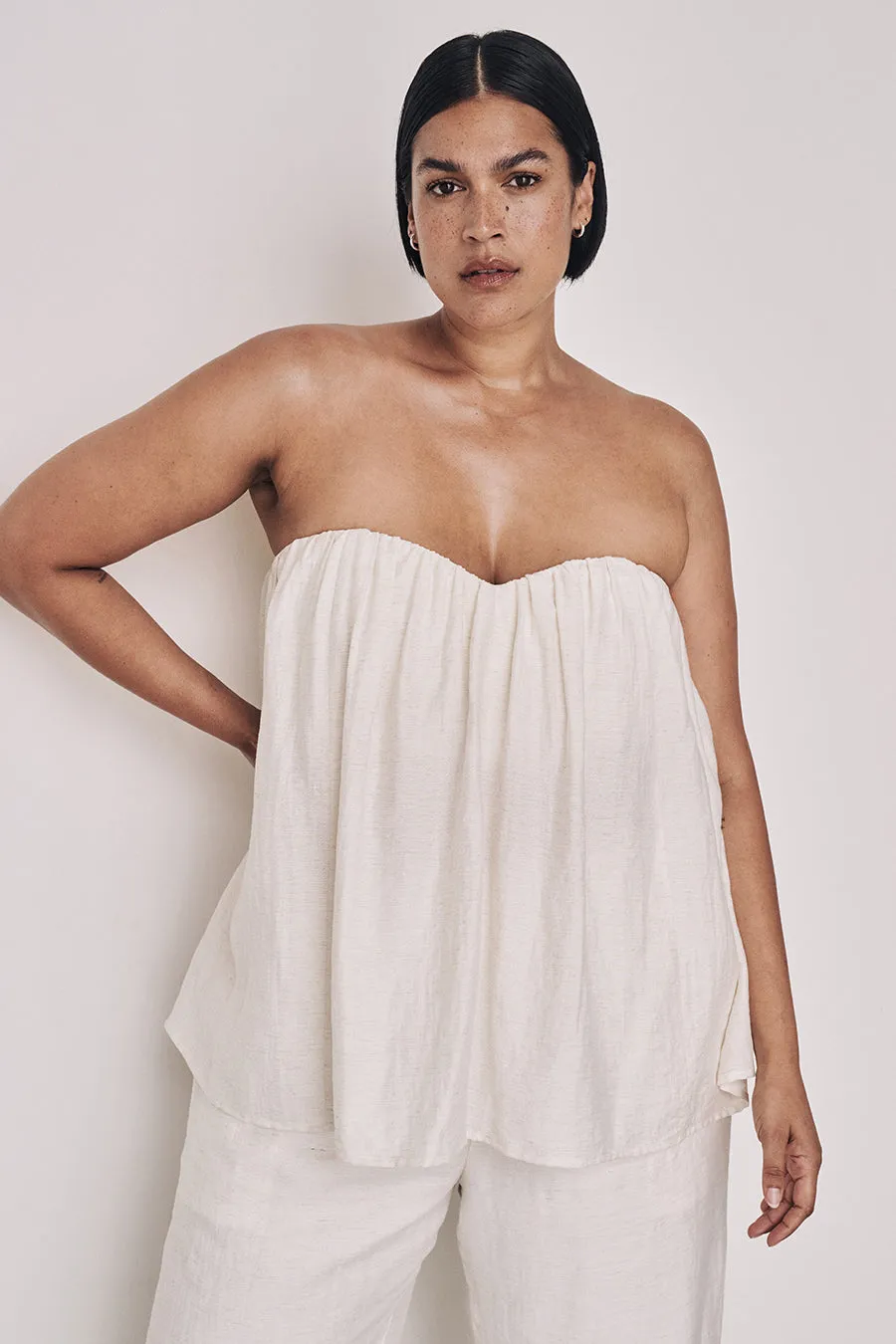SHANIYA OFF WHITE STRAPLESS TOP sold by Dissh