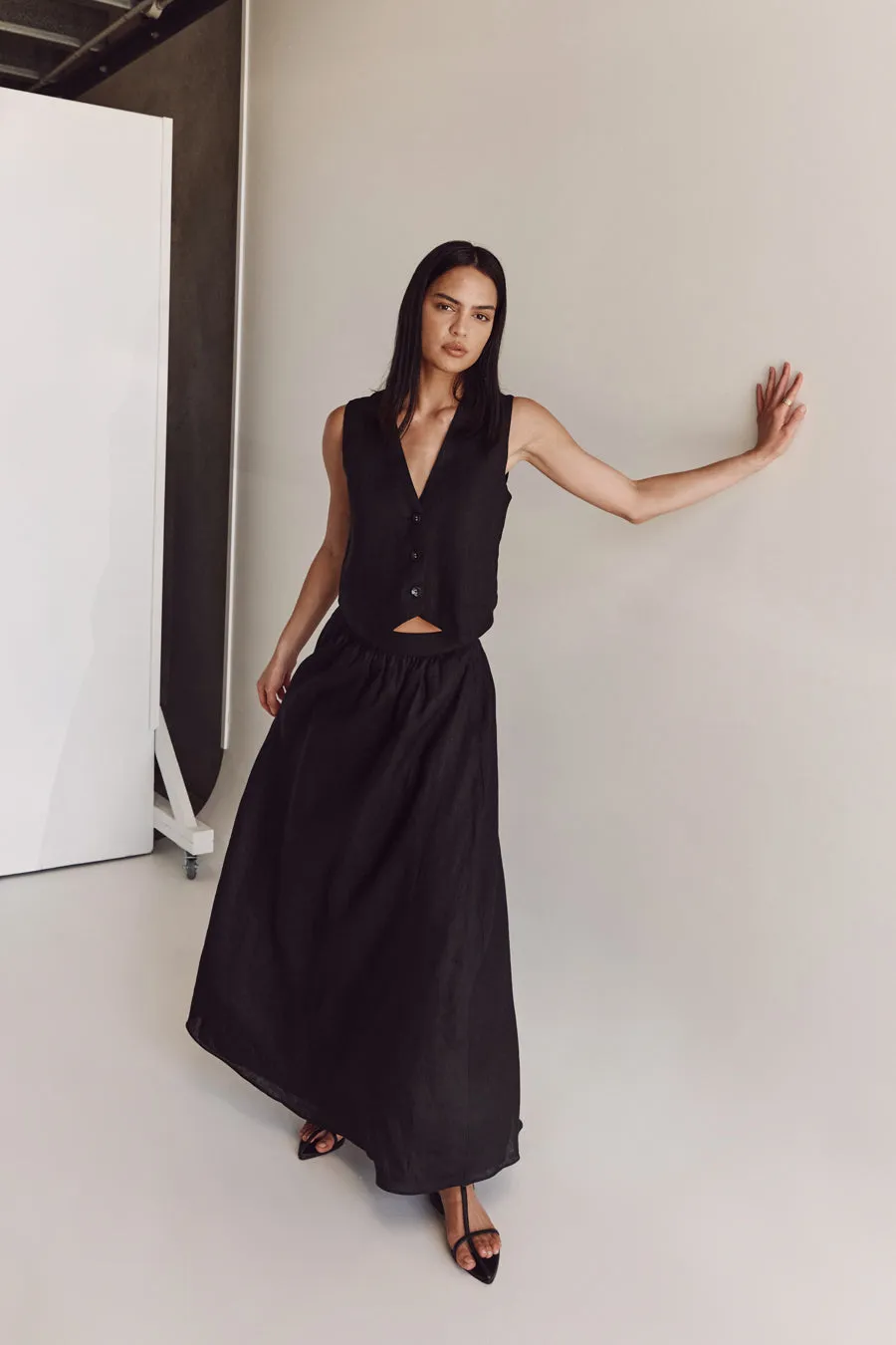GEMIMA BLACK LINEN MIDI SKIRT sold by Dissh