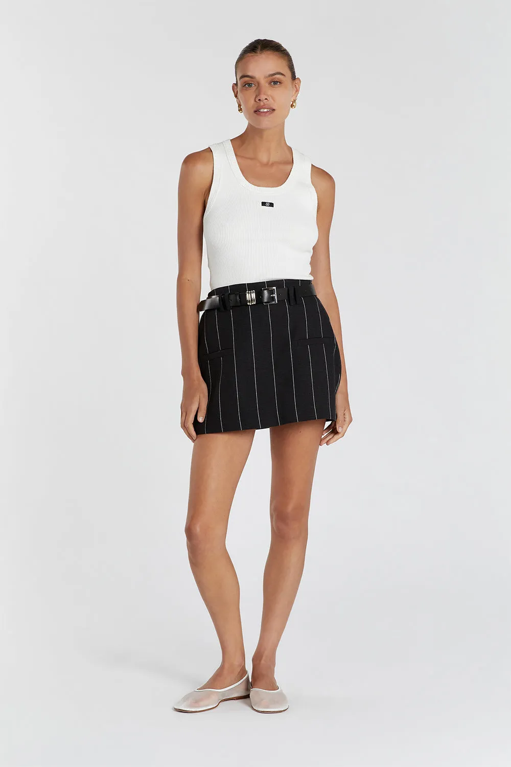 CARA BLACK PINSTRIPE SKORT sold by Dissh