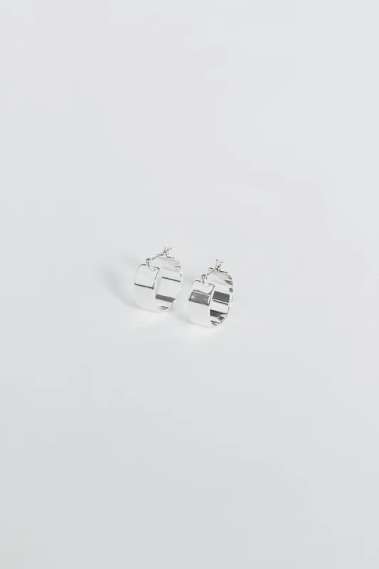 LUV AJ THE POSITANO SILVER HOOPS sold by Dissh
