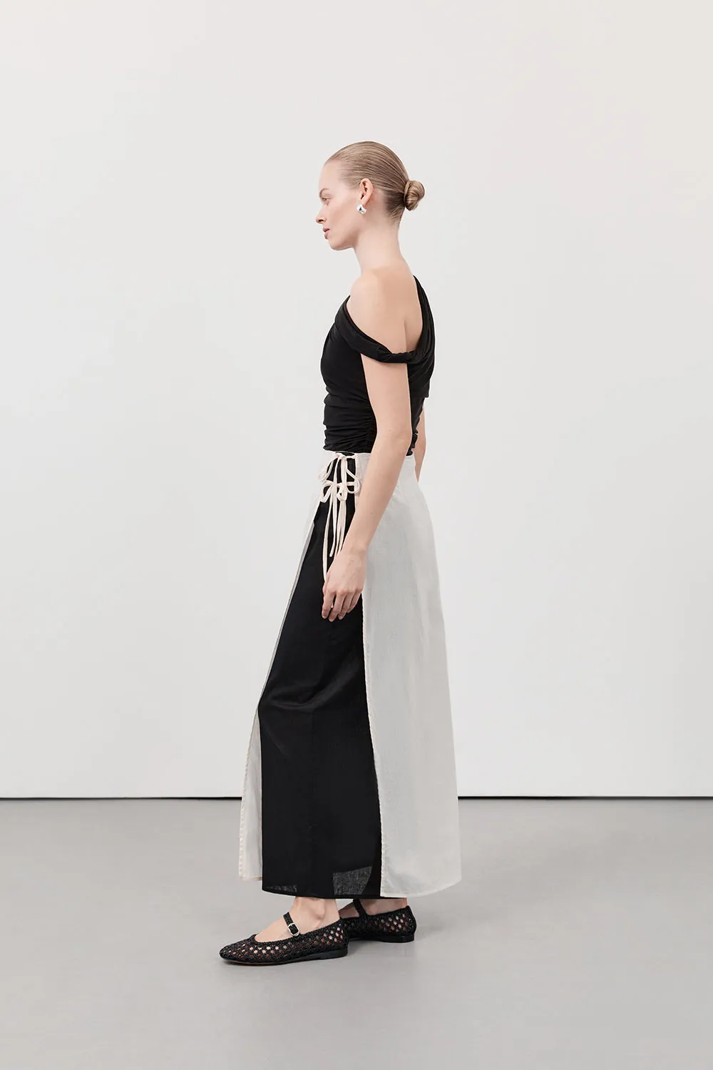 MEGAN CREAM/BLACK WRAP SKIRT sold by Dissh