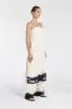 LILY CREAM PRINTED TUNIC TOP sold by Dissh