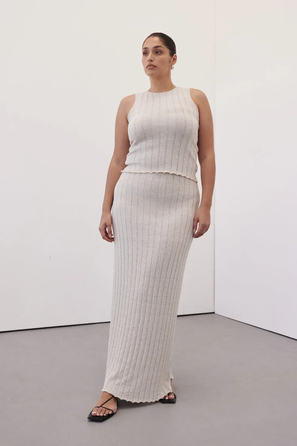 REM STONE KNIT MIDI SKIRT sold by Dissh