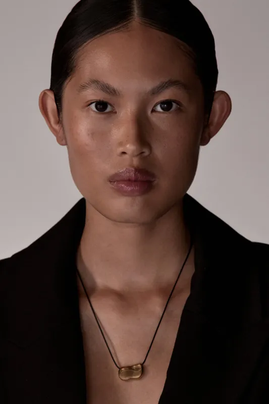 HEAVEN MAYHEM PEBBLE GOLD NECKLACE sold by Dissh