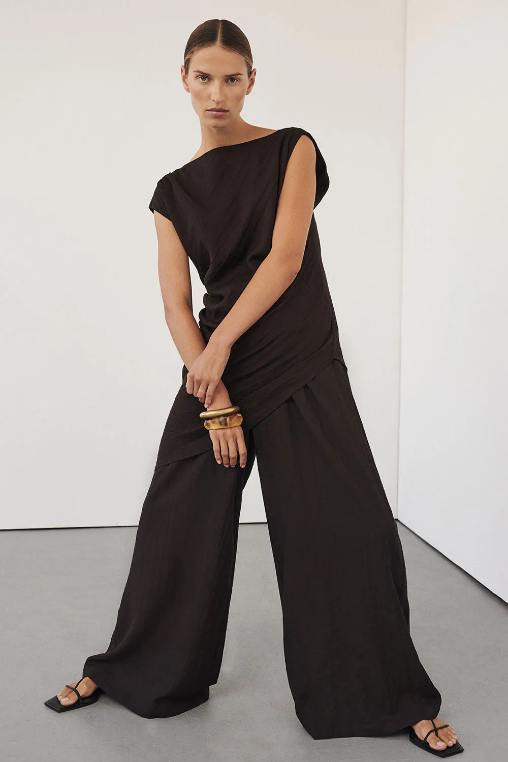 SHYLA BITTER CHOC ASYMMETRICAL TOP sold by Dissh