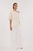 RICK CREAM ASYM KNIT TOP sold by Dissh