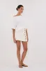 DEMI CREAM TAILORED SKORT sold by Dissh