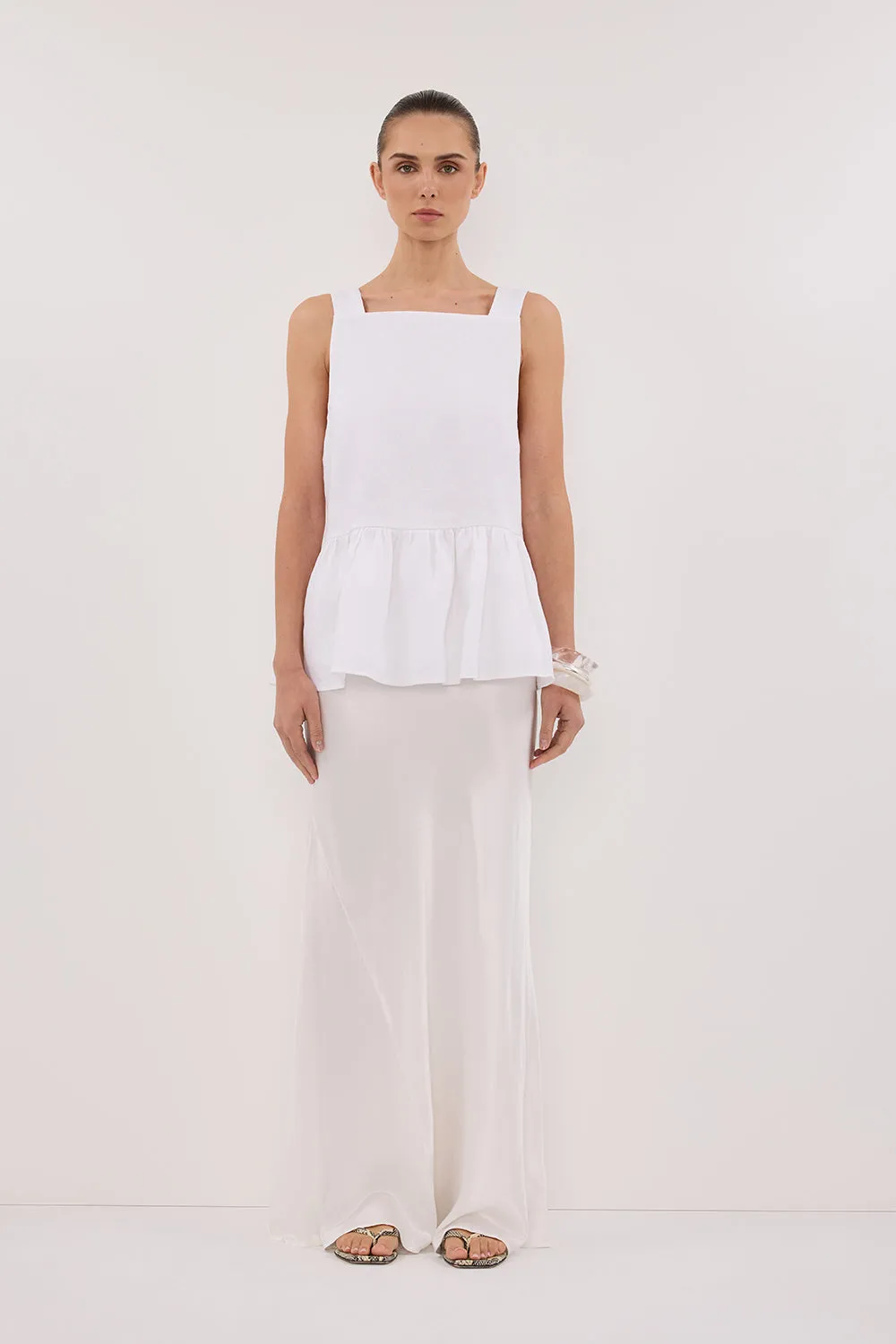 DAISY WHITE LINEN PEPLUM TOP sold by Dissh