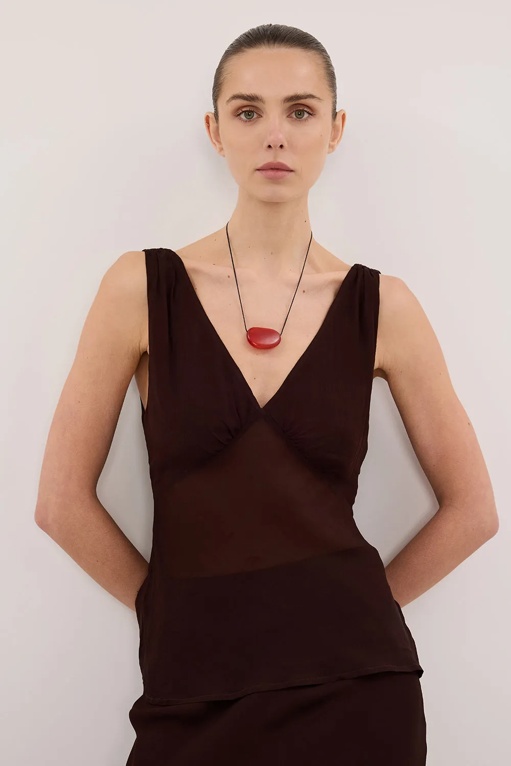 JORJA DARK CHOC SLEEVELESS V NECK TOP sold by Dissh